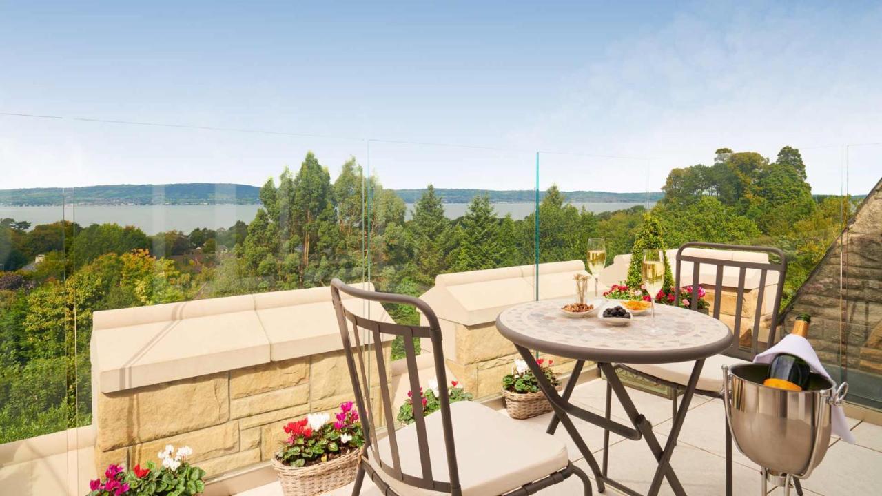 The Culloden Estate And Spa Holywood  Eksteriør billede A view of the lake from the balcony of a house in the village